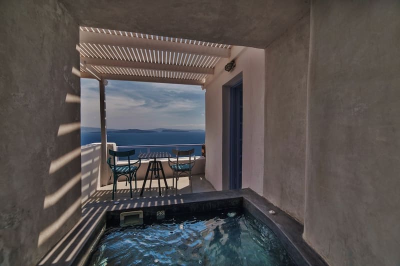 Private hot tub at Armeni Village Rooms & Suites, Santorini — photo 4