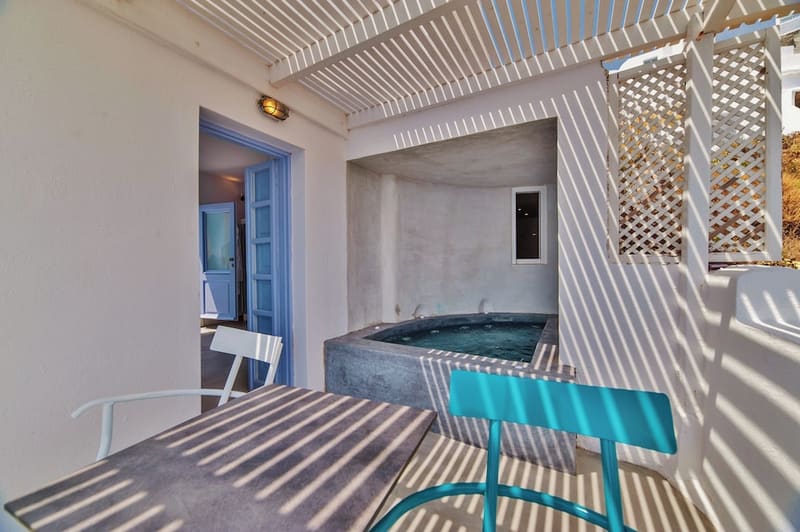 Private hot tub at Armeni Village Rooms & Suites, Santorini — photo 3