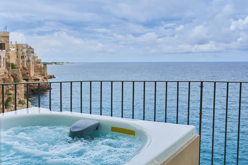 Private jacuzzi at Grotta Palazzese, Polignano a Mare — photo 3