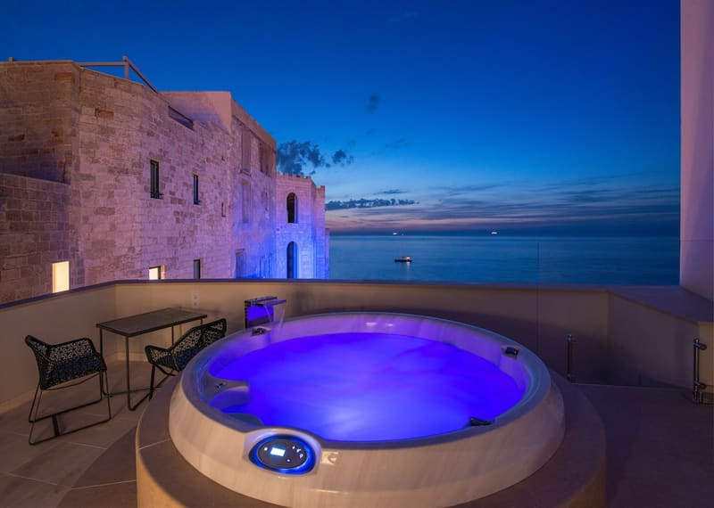 Private jacuzzi at Grotta Palazzese, Polignano a Mare