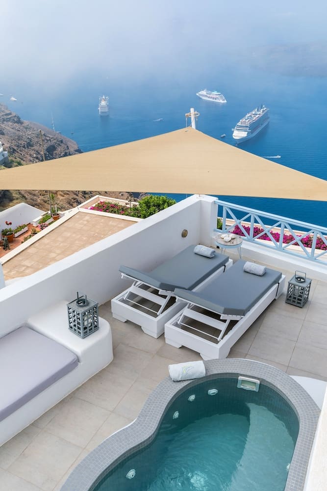 Private jacuzzi at Blue Dolphins Apartments & Suites, Santorini — photo 2
