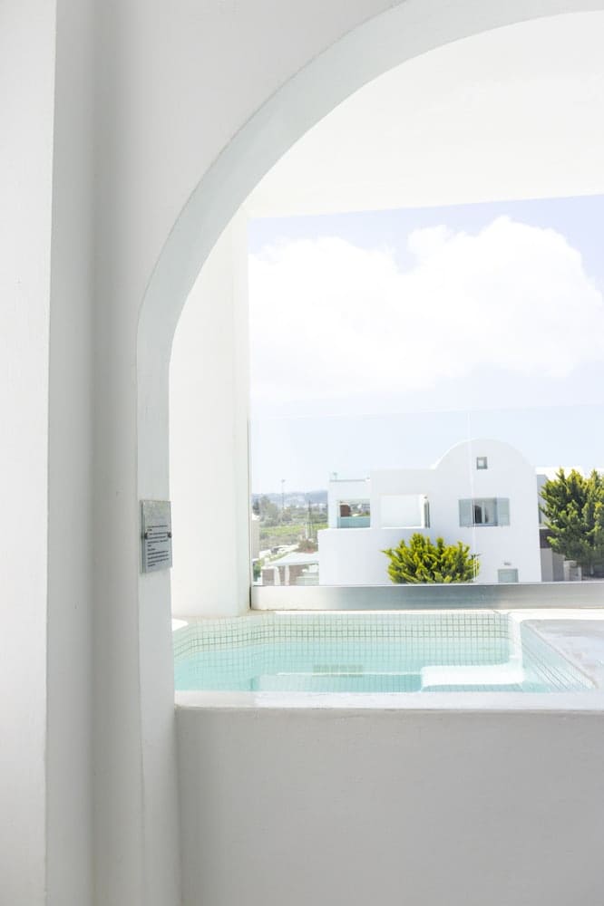 Private hot tub at Astro Palace Hotel & Spa, Santorini — photo 2